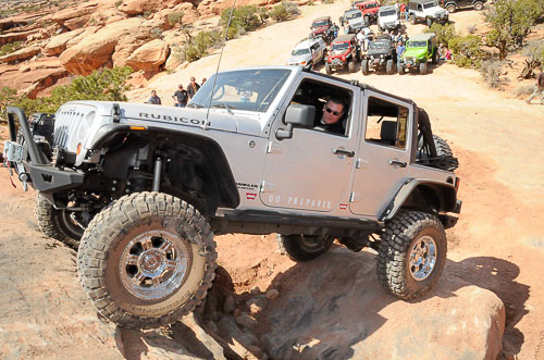 JK Wrangler scaling a rock wall at Moab EJS 2010