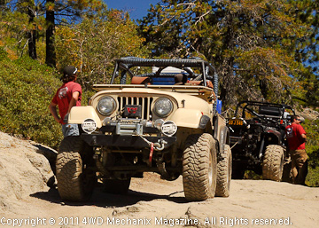 A CJ-7 Jeep exiting the Rubicon with an MB in tow—2010.