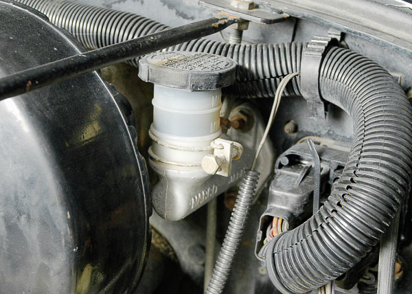 Clutch master cylinder on a Jeep Wrangler.