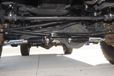 Magazine's '05 Ram 3500 lift included a track bar relocation (drop) bracket.