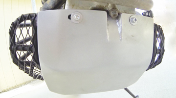 TCI Products metal skid plate and durable engine side guards on the Honda XR650R dual-sport motorcycle