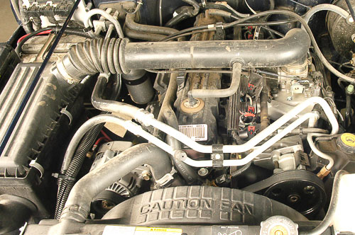 Engine bay overview and winch cable routing.